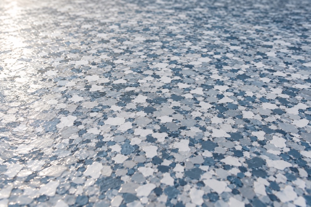 Blue-grey and white decorative epoxy flake surface detail